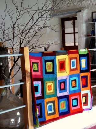 Plaid carré en tricot