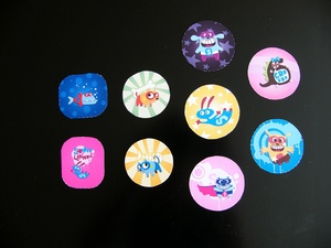 Ensemble des neuf dessins pour les badges